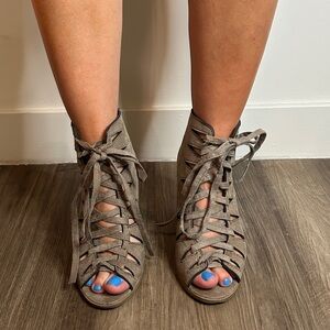 Soda tan wedge heels, size 8. Zips in the back, ties in the front.